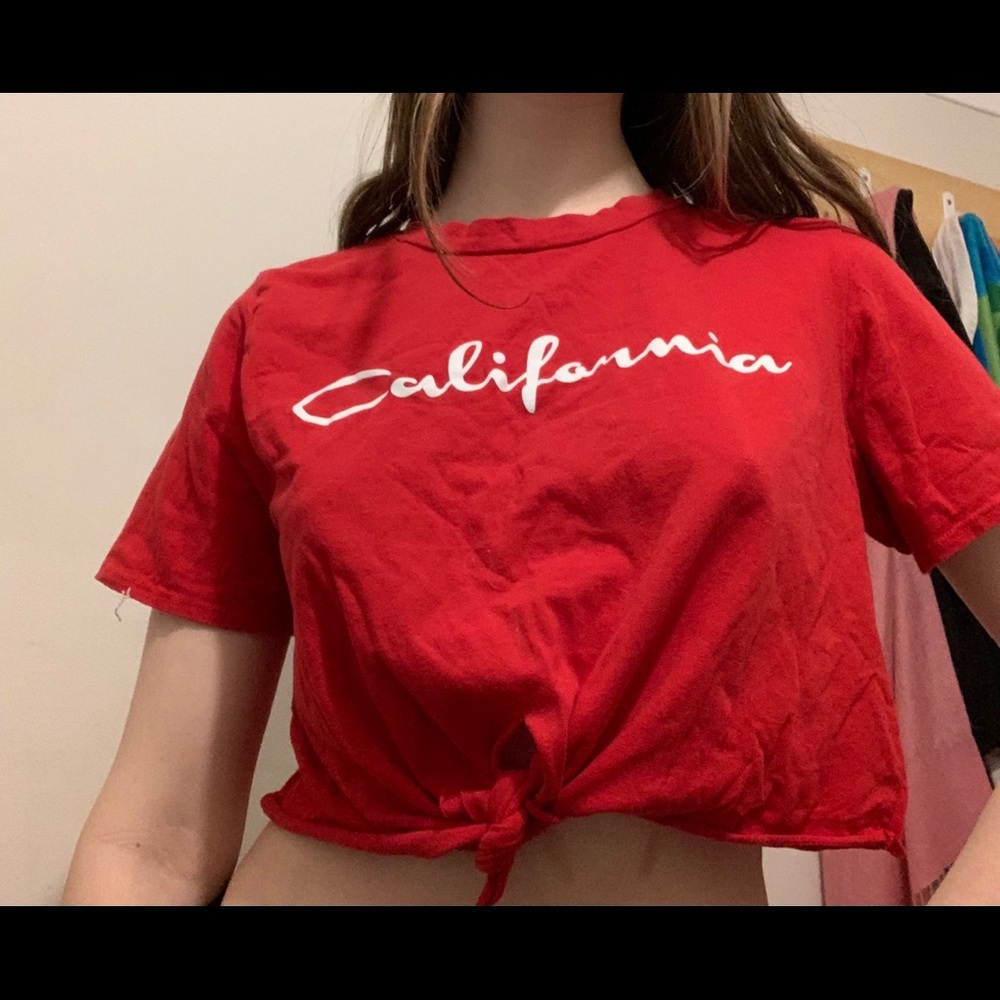 Red crop top with a knot in front from Queen bees.
